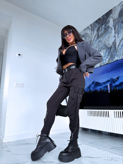 LABĀKĀS auduma bikses ar rāvējslēdzējiem galos - MELNAS