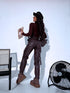 Choco imitation leather pants with zippers at the ends