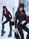 Black, stretchy jumpsuit with front zipper