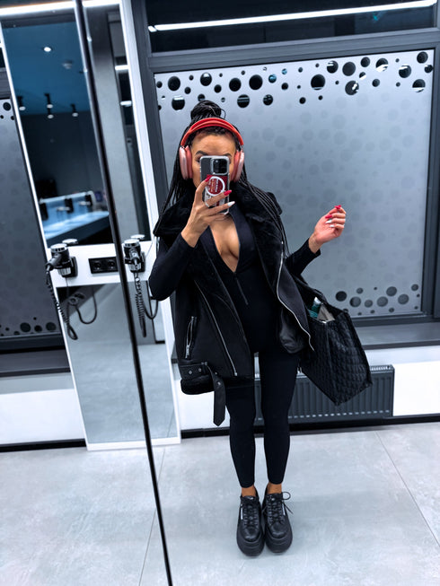 Black, stretchy jumpsuit with front zipper