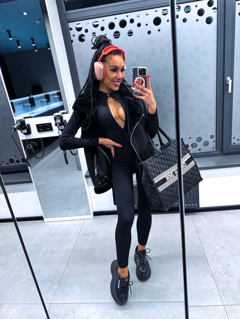 Black, stretchy jumpsuit with front zipper