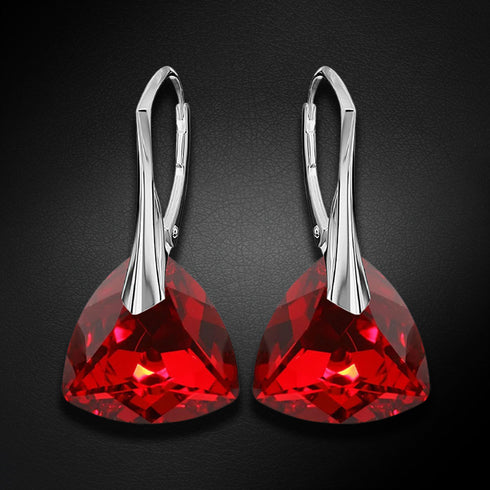 Sudraba auskari "Vakara Mirdzums (Light Siam Comet Argent Light)" ar Swarovski™ kristāliem